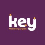 Vintage-style round coffee logo with a beige center and dark brown border. It features a steaming coffee cup with steam shaped like leaves, and the word "COFFEE" in bold uppercase letters underneath. Background is split vertically into dark brown and light brown halves.